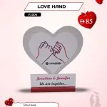 Love Hand acrylic photo frame from AB Print House, UV printed with custom photo and message, standing on a red base.
