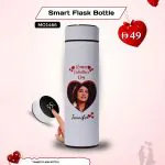 Valentine’s Day smart flask bottle with a digital temperature display, printed with a romantic couple photo on the front, standing upright on a plain surface as a special gift for a loved one.